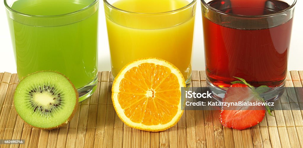 Fresh colorful fruit drinks Fresh colorful fruit drinks with kiwi, orange and strawberry 2015 Stock Photo