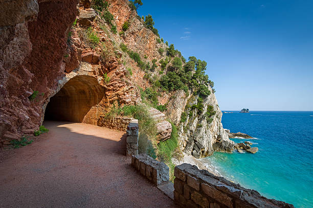 istock Pedestrian tunnel through the rocks 482496106