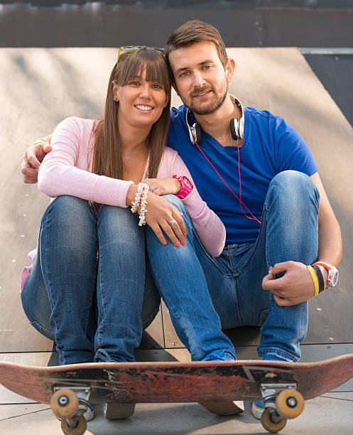 istock Young couple at the skatepark 482503249