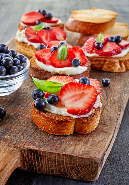 istock toasted bread with berries and cream cheese 482505948