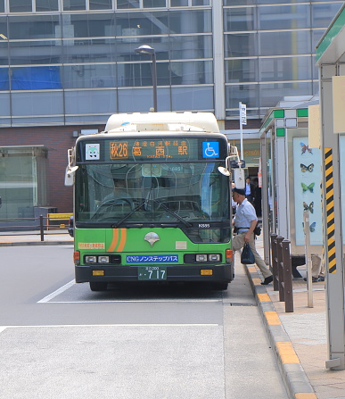 Tokyo Japan - May 22, 2015: People take a local bus at Akihabara station Tokyo Japan.