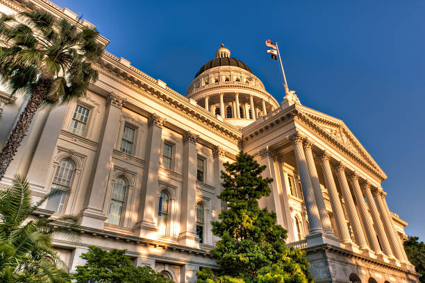Capitol lit by setting sun California State Capitol building in the warm light of the setting sun. sacramento photos stock pictures, royalty-free photos & images