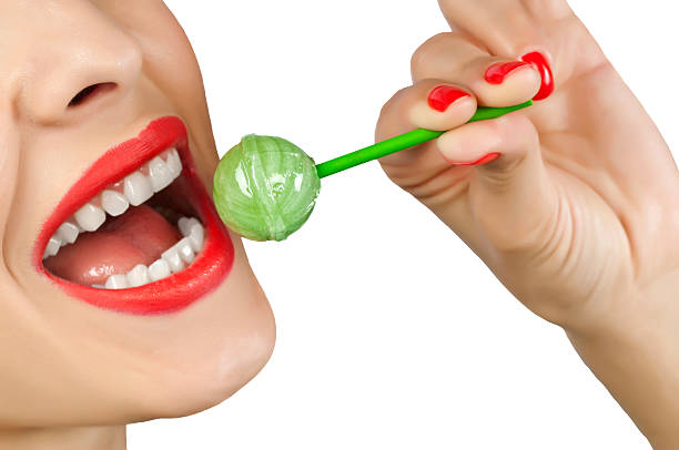 istock Cute woman with bright candy 482508763