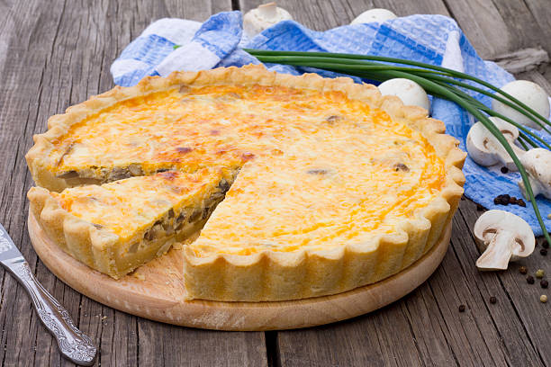 istock Open pie with mushrooms and cheese, shortcrust pastry 482509256