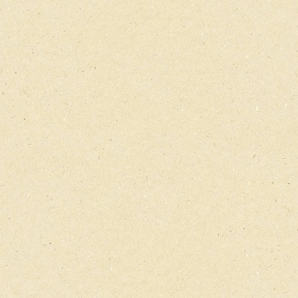 istock Light beige decorative paper background with fine fragments of components 482509334