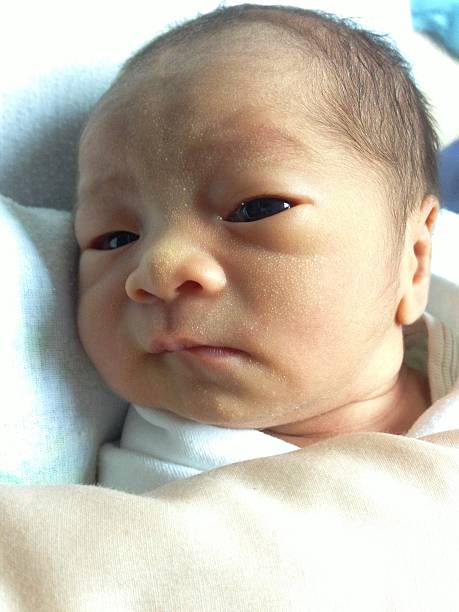 istock new born baby open eyes in first day 482510681