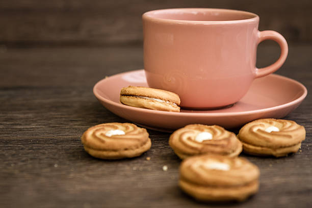 istock Cup of Tea and Biscuits with Magazine 482511188