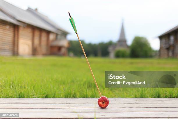 Arrow In Apple Stock Photo - Download Image Now - Arrow - Bow and Arrow, Apple - Fruit, Archery