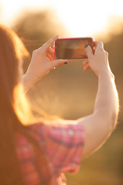 istock Beautiful girl in the park 482512027