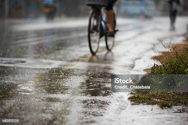 Heavy Rain Stock Photo - Download Image Now - Cycling, Rain, Bicycle