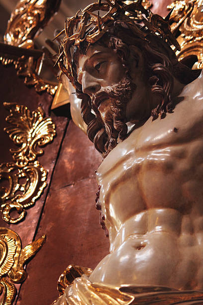 istock crucified Jesus Christ statue (fragment. Baroque style) 482515834
