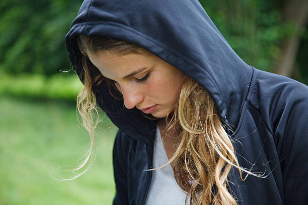 istock Girl with hood 482518236