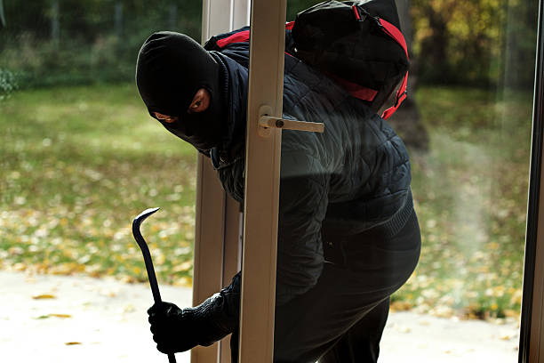istock Burglar entering to house 482519255