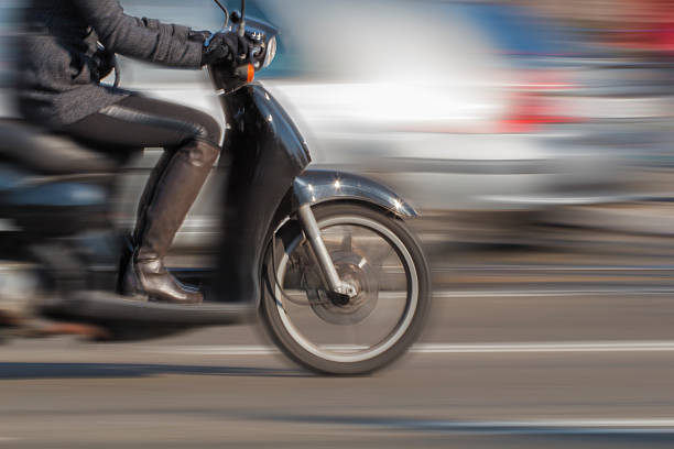 Girl on Scooter - Blurred Motion