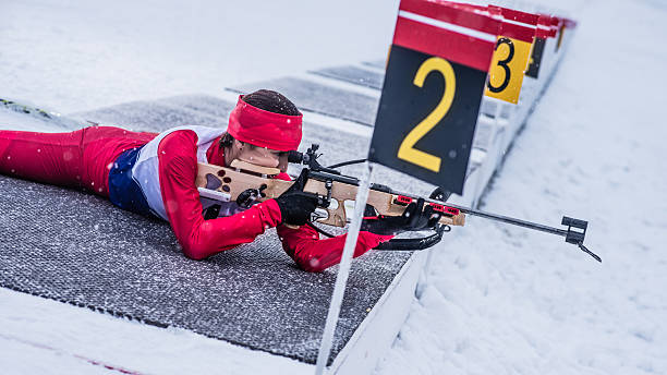 istock Female shooting at biathlon training 482519956