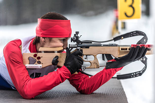 istock Female shooting at biathlon training 482519974
