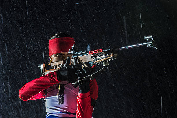 istock Female shooting at biathlon training at night 482519992