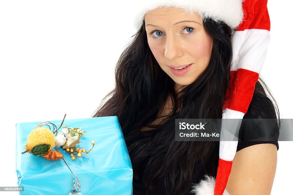 Christmas time pretty woman with a christmas gift Adult Stock Photo