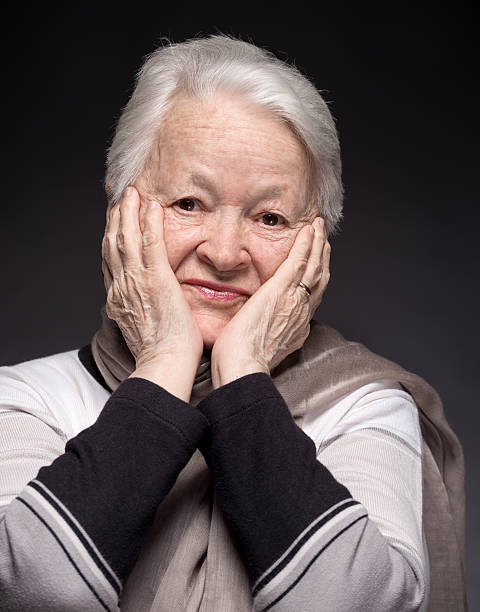 istock Portrait of smiling old woman 482522421