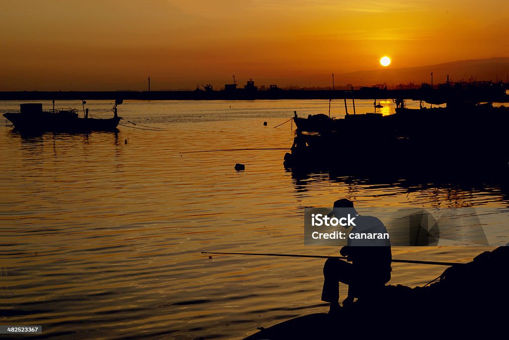 In the evening on fishing Active Lifestyle Stock Photo
