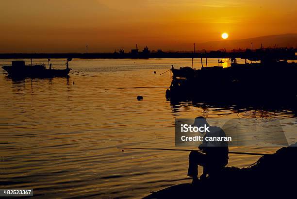 In The Evening On Fishing Stock Photo - Download Image Now - Active Lifestyle, Active Seniors, Activity