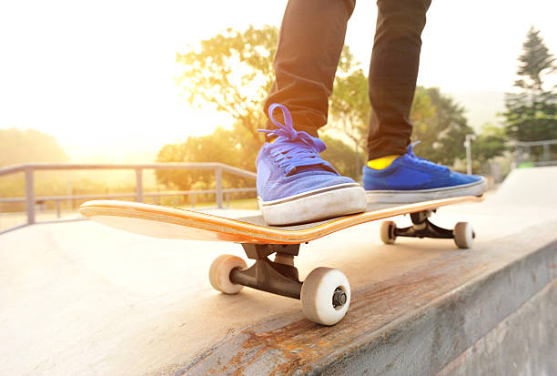 istock Legs in sneakers on a skateboard 482524123