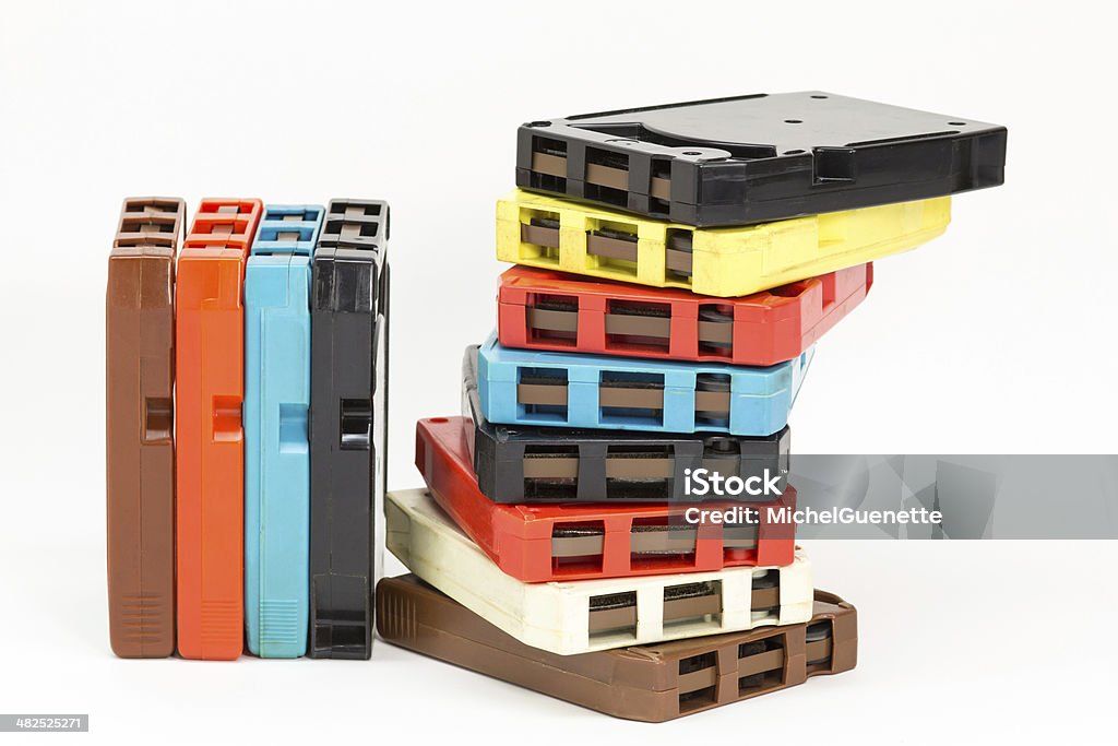 Old fashioned 8-track audio tapes Many old 8-track audio tapes of different colors 8-track Stock Photo