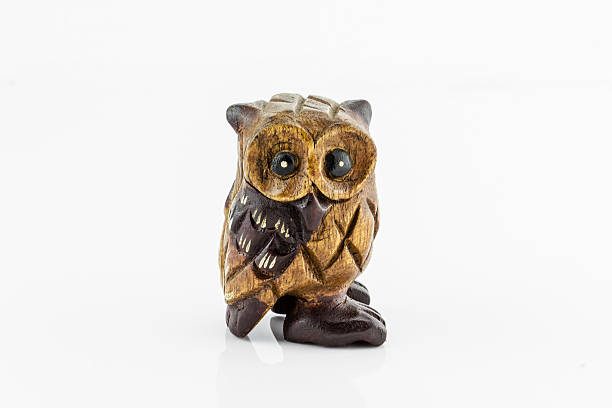 istock Wooden carved Owl on white background 482528320