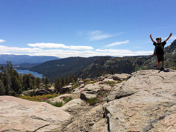 istock I did it. A child accomplishes a big hike. 482528994