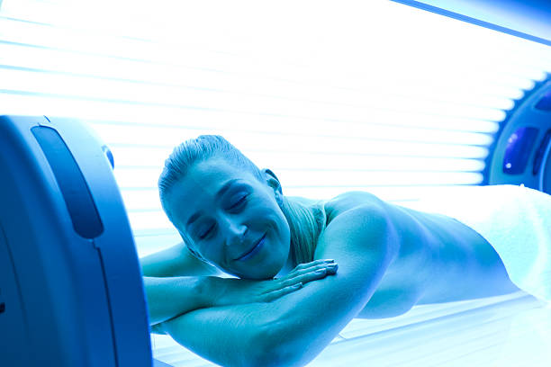 istock Woman on tanning bed 482531611