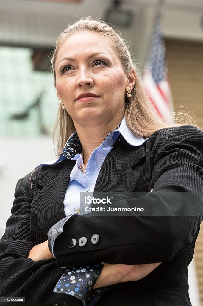 Looking at the future with determination Mature caucasian female business executive posing looking away 40-44 Years Stock Photo