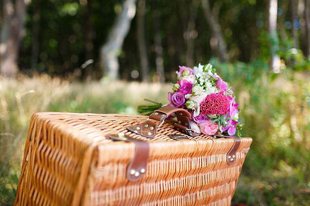istock Bridal bouquet on a suitcase 482533234