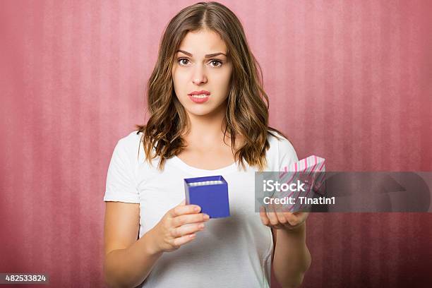 Beautiful Girl With A Gift Box Stock Photo - Download Image Now - Gift, Disappointment, Women