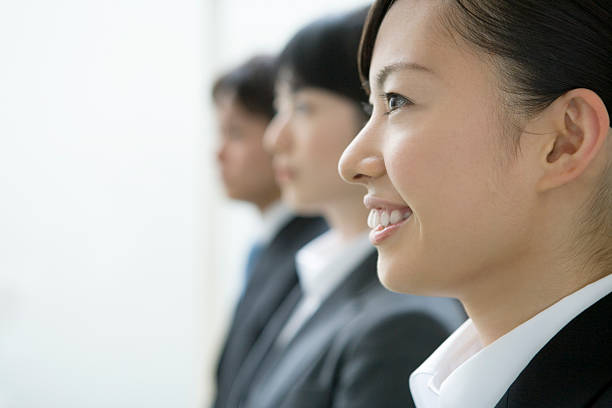 sonriente mujer de negocios - professional occupation three people businessman human head fotografías e imágenes de stock