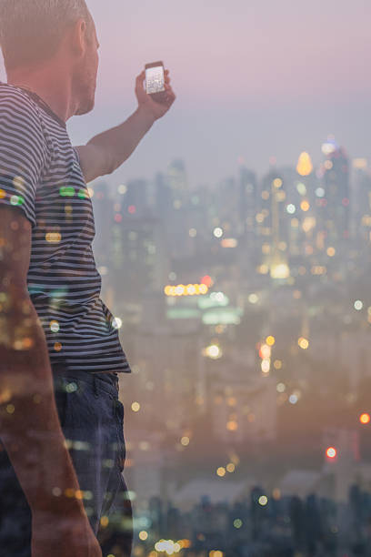 istock Man Taking Pictures with Smart Phone 482535229