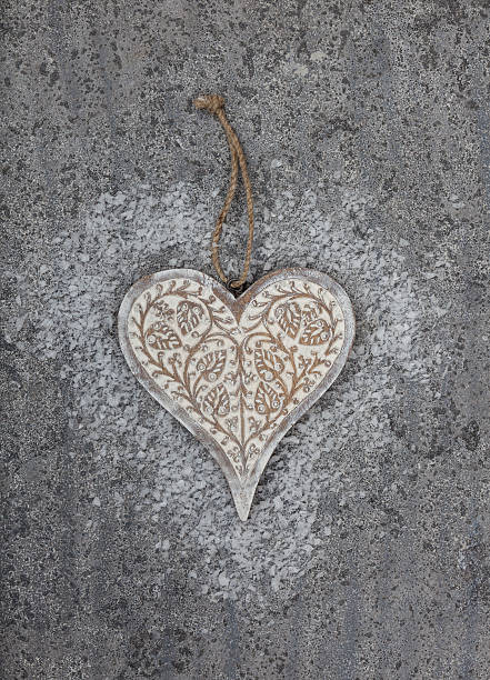 istock Wooden heart on grey stone background 482537227
