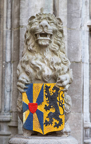 A coat of Arms on a lion statue in Bruges, Belgium