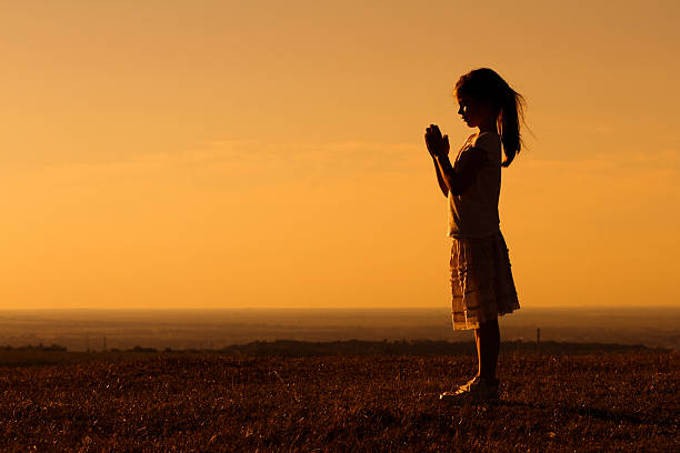 istock Little girl meditating 482540722