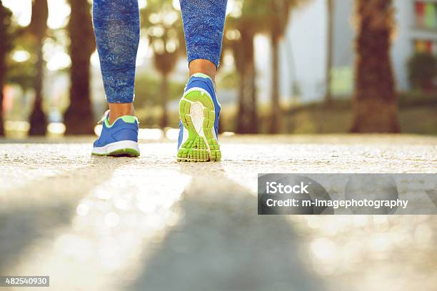Female Running Shoes From Behind Stock Photo - Download Image Now - Walking, Racewalking, Springtime