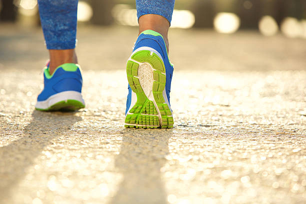 istock Low angle close up female running shoes 482540938