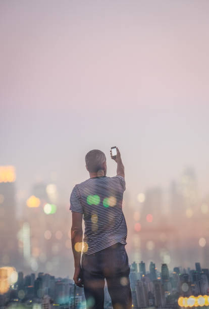 istock Man Taking Pictures with Smart Phone 482543021