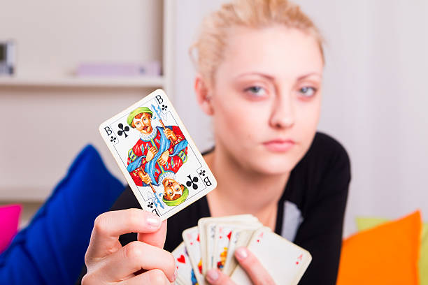 istock The girl holds a Jack card 482545166