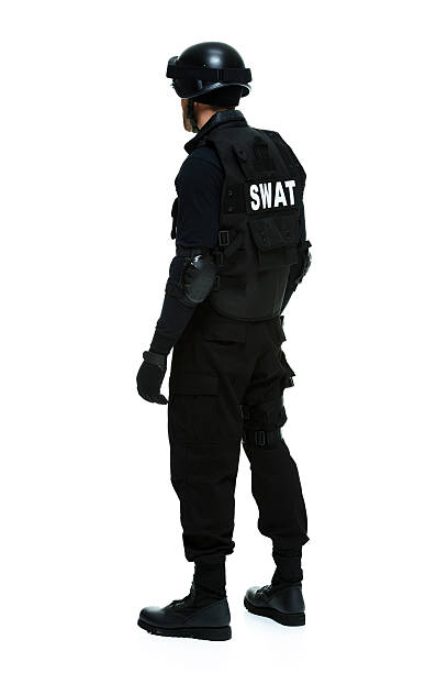 istock Rear view of police looking away 482545347