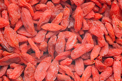 Lot of dray red goji berrys. Goji berrys are very healthy fruits with lot vitamin. Macro Picture.