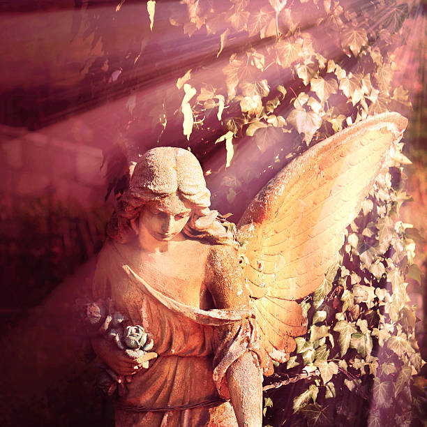 istock golden angel in the sunlight (antique statue) 482546540