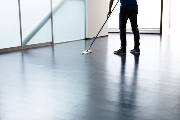 Man cleaning the floor Man cleaning the floor with a mop chico california photos stock pictures, royalty-free photos & images