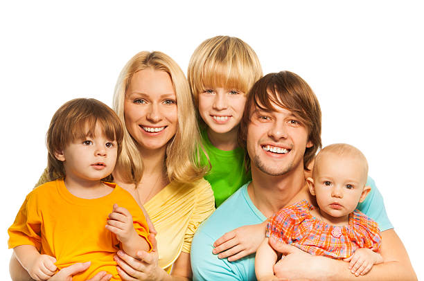 Happy family with young parents and three kids