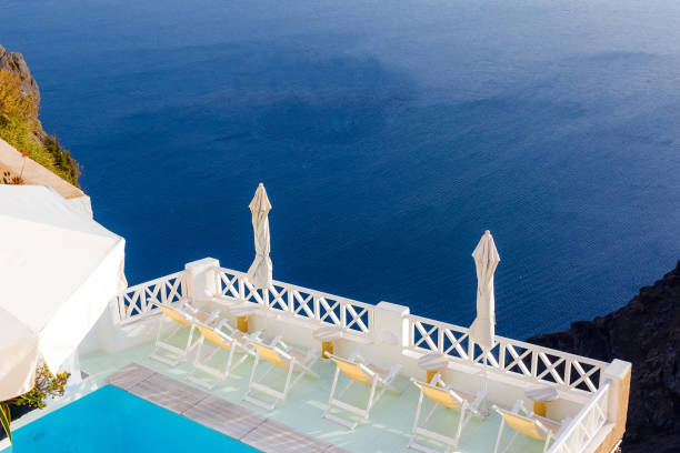 istock Sunbeds near pool in Greece 482549093