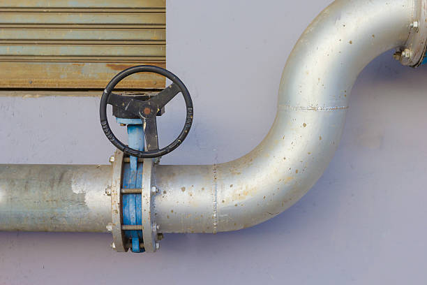 istock pipe and water valve outdoor building 482552584