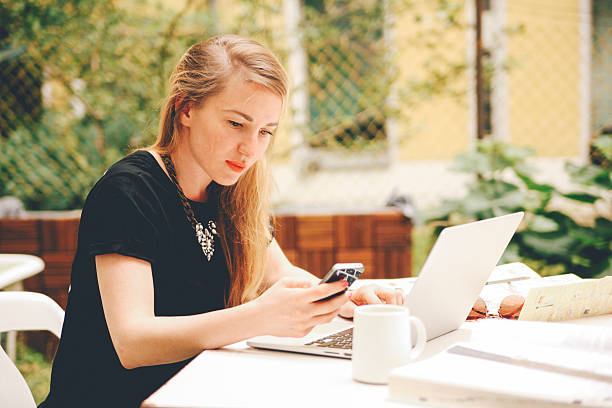 istock blonde haired woman at work 482555230